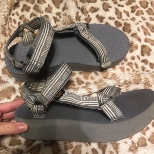 Gray Teva flatforms